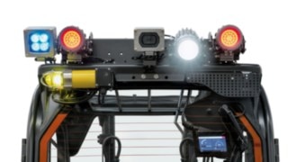 Diversos sistemas de iluminación de seguridad y la Linde Reverse Assist Camera en la carretilla eléctrica antideflagrante E14 de Linde MH