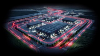 Las soluciones de Linde ayudan a garantizar el flujo de producción en la industria del automóvil. Almacén desde arriba por la noche